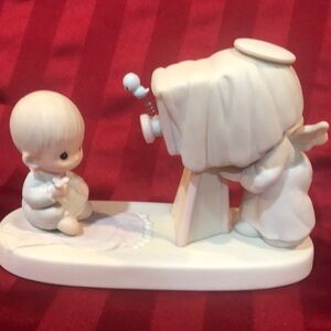Porcelain Angel and Child Figurine